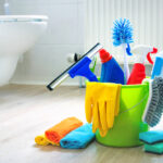 Various,Cleaning,Items,And,Supplies,In,A,Bucket,On,The