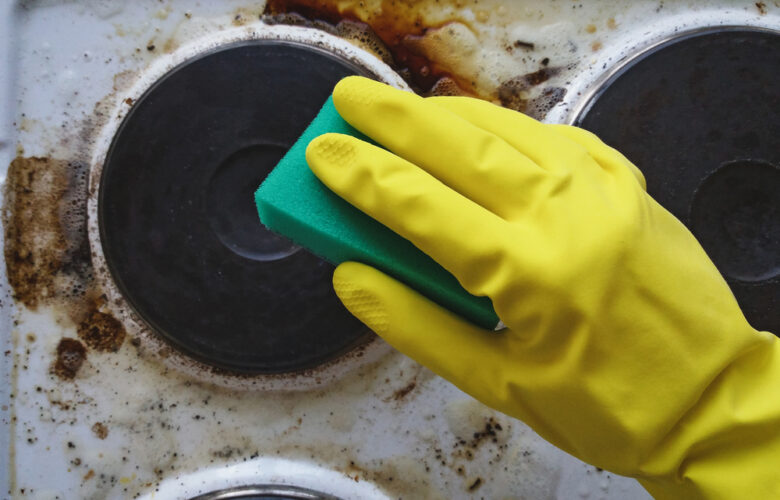 Hand,In,Glove,Washing,Messy,Kitchen,Stove