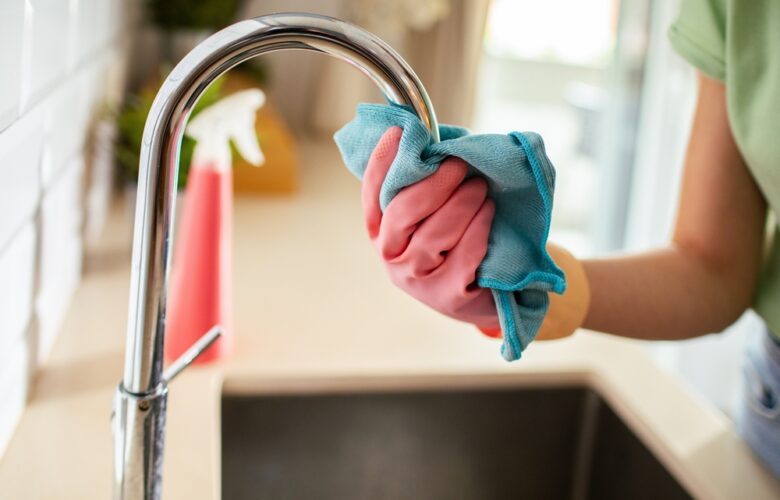 Close-up,Of,A,Young,Woman,Cleaning,Her,Kitchen